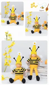 Adorable bee gnome dolls with striped sweaters and wings, detailed view for spring decor