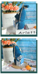 Dettaglio ravvicinato dello gnomo oceanico con cappello blu e decorazione a stella.