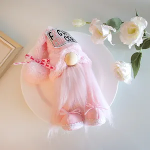 Pink faceless plush gnome doll with Fight Cancer patch for breast cancer awareness