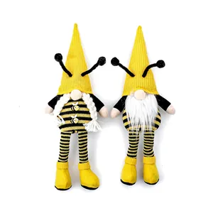 Set van twee geel-zwarte Bijenfestival pluche kabouters met lange benen op witte basis