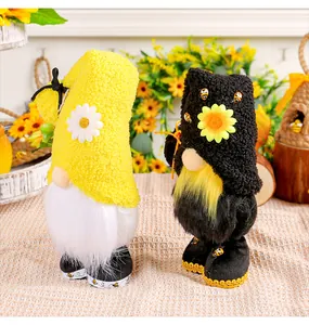Handcrafted bee festival gnomes featuring sunflower hats and bumblebee accents for decor.