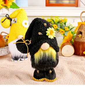 Detailed view of handmade bumblebee festival gnomes with sunflowers and bee accents