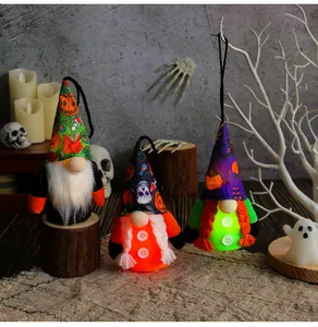 Decorative glowing Halloween gnome plush ornaments with skull and pumpkin patterns for holiday