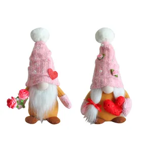 Pair of Mother's Day faceless gnomes with pink knitted hats holding roses and hearts