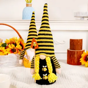 Handmade bee festival gnomes set with striped hats and sunflower decor