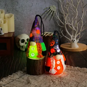 Glowing Halloween gnome plush hangers with LED lights and festive pumpkin patterns.