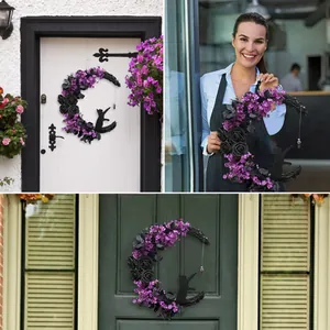 Detailed views of Halloween crescent moon cat wreath with black roses on various doors