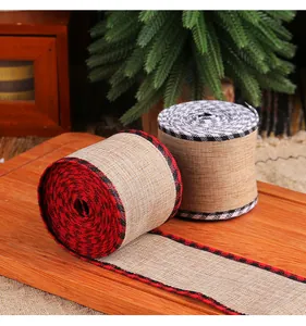 Detailed macro shot of natural burlap Christmas ribbons with red and white plaid edges