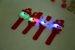 Detailed view of four LED Christmas slap bracelets featuring festive character designs