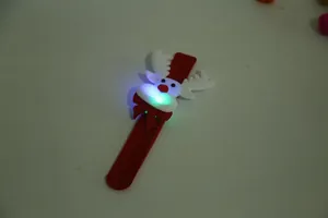 Glowing LED Christmas reindeer slap bracelet for kids with a soft red fabric band.
