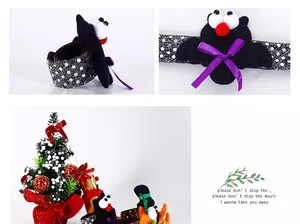 Macro detail of plush bat character with purple bow on sequined Halloween slap bracelet
