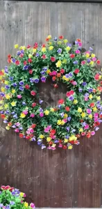 Couronne de fleurs artificielles colorées pour décoration de porte sur bois