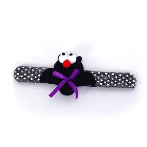 Halloween themed black bat slap bracelet with purple ribbon for kids party costume