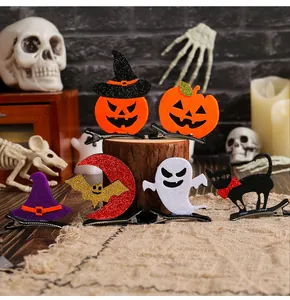 Sammlung entzückender Halloween-Haarspangen mit Kürbis-, Geist-, Fledermaus- und Katzendesign