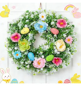 Detailed view of Easter wreath with colorful eggs and vibrant artificial flowers