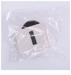 Close-up detail of the mini Halloween witch hat hair clip inside clear plastic packaging