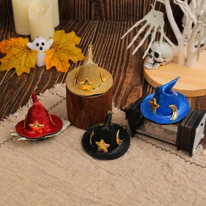 Set of four colorful glitter Halloween mini witch hat hair clips with gold star and moon motifs