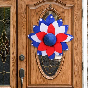 Patriotic Independence Day wreath with red, white, and blue stars on wooden door