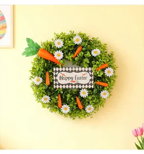 Close-up view of a lush Easter wreath featuring daisies, carrots and a Happy Easter sign