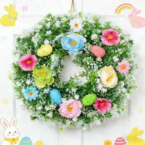 Spring Easter wreath with colorful flowers and speckled eggs for festive door decoration