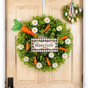 Artificial Easter wreath featuring white daisies, carrots, and Happy Easter sign on door