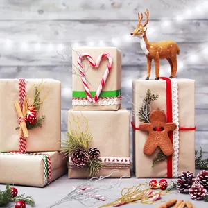 Decorative gold and silver glitter Christmas twigs for holiday gift wrapping and crafts