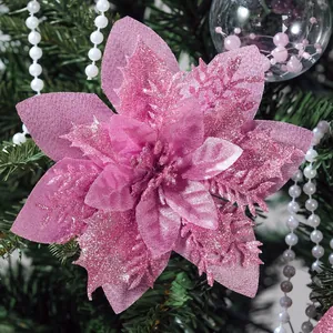 Close-up of a pink glittery artificial flower head for Christmas tree wreath decoration