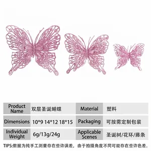 Detailed view of three pink glitter double-layer hollow Christmas butterflies in varied sizes.