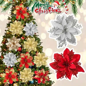 Fiori di stelle di Natale glitterati in rosso, oro e argento per l'albero di Natale