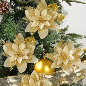 Glittery gold artificial poinsettia flowers for elegant Christmas tree holiday decoration