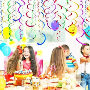 Vibrant multi-colored PVC spiral hanging decorations in a birthday party setting