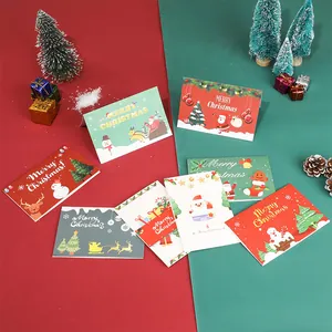Cartes de vœux de Noël assorties avec motifs de Père Noël, rennes et bonshommes de neige