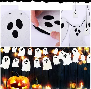 Detail shot of white felt Halloween ghost banner with material thickness view