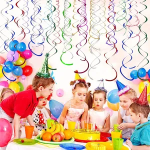 Colorful PVC spiral hanging decorations used for a vibrant kids' birthday party scene