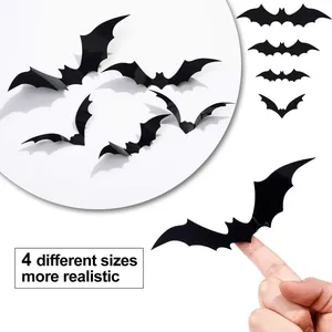 Detail showing 4 different sizes of 3D black bat wall stickers for Halloween