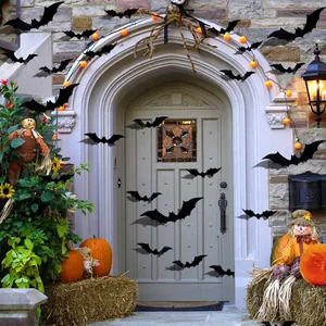 3D Halloween bat wall stickers decorated on a stone house door with pumpkins.
