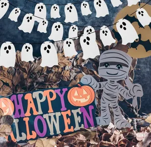 Detail of white ghost felt garland and cartoon mummy banner for Halloween party decor