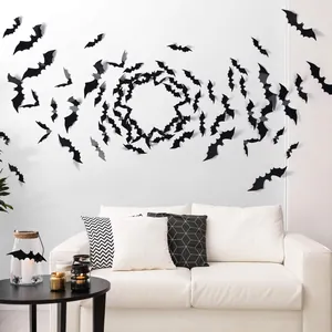Detail view of 3D black bat stickers creating a spooky and stylish Halloween wall display