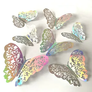 Close-up of 3D laser hollow butterfly wall stickers with iridescent holographic finish.