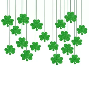 Close-up of glittery green shamrock hanging garland for St. Patrick's Day party decor