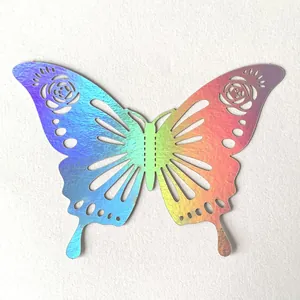 Macro view showing the holographic texture of laser-cut butterfly wall sticker