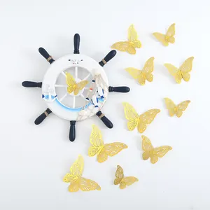 Elegant 3D hollow golden paper butterfly wall stickers for home and wedding decor