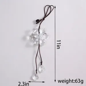 Detailed view of crystal flower car charm with dimensions 28cm height and 6cm width