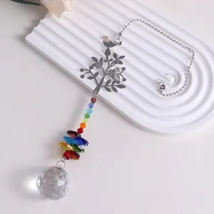 Detailed macro view of rainbow crystal suncatcher hanging ornament with life tree design