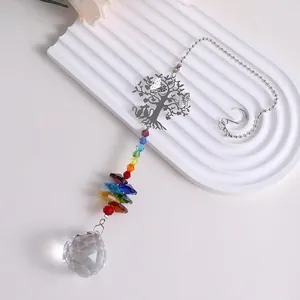 Macro view of rainbow crystal suncatcher with Tree of Life and faceted clear ball