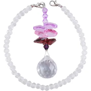 Detailed view of faceted crystal suncatcher beads and a clear crystal pendant ball