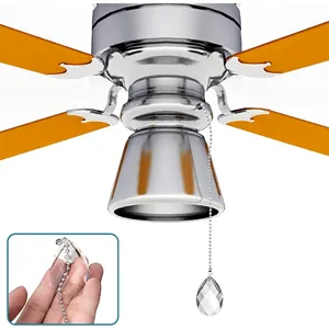 Macro view of clear faceted teardrop crystal pendant bead chain for ceiling fan pulls.
