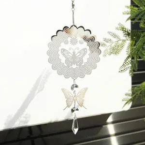 Detail of 3D mandala butterfly wind spinner with hanging crystal pendant for garden