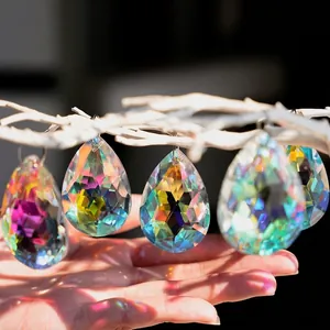 Macro detail of teardrop crystal suncatchers with rainbow AB coating reflections
