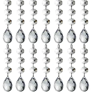 Detail view of clear faceted acrylic teardrop beads on vertical strands for decoration
